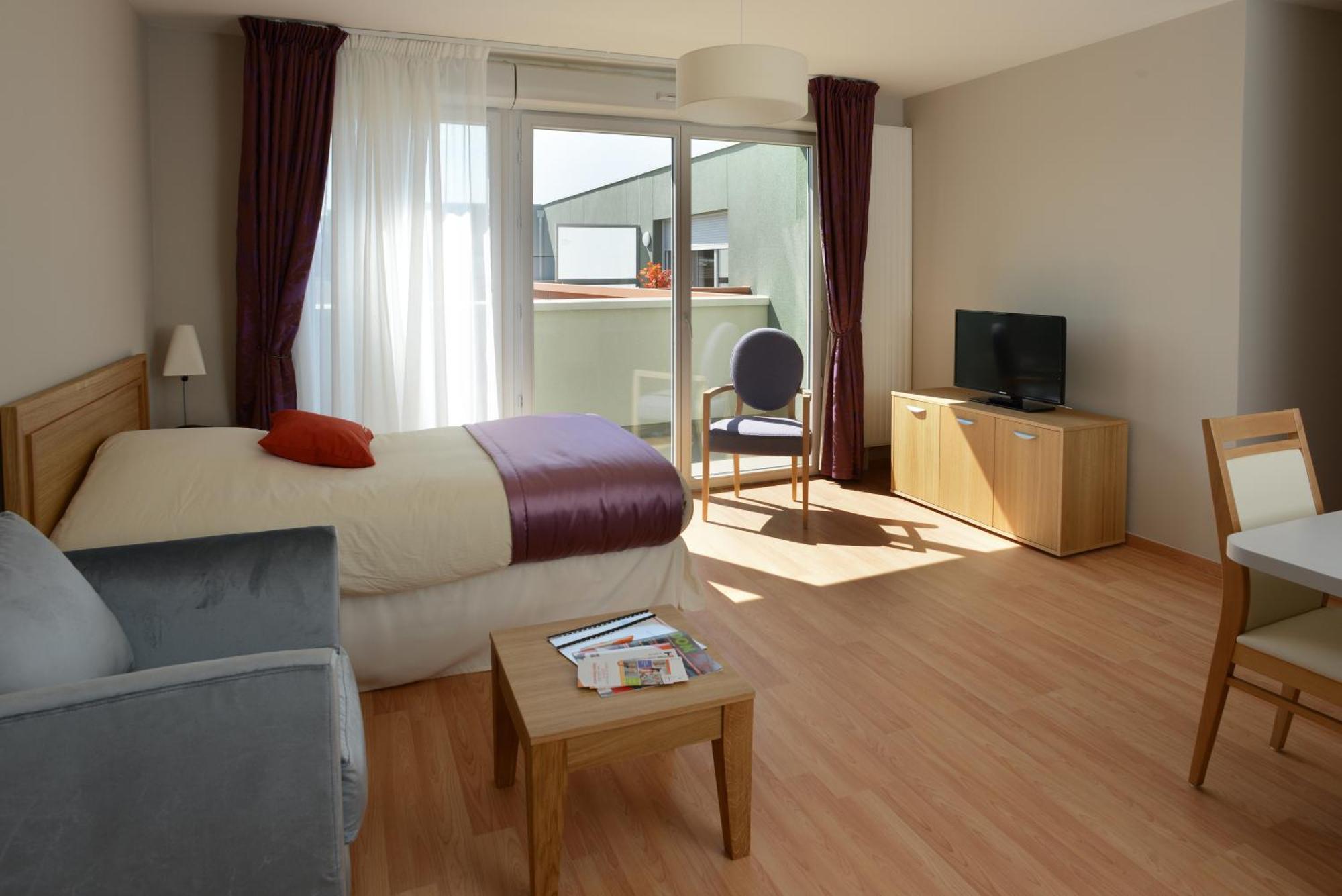 Aparthotel Domitys Le Vallon Des Bois *